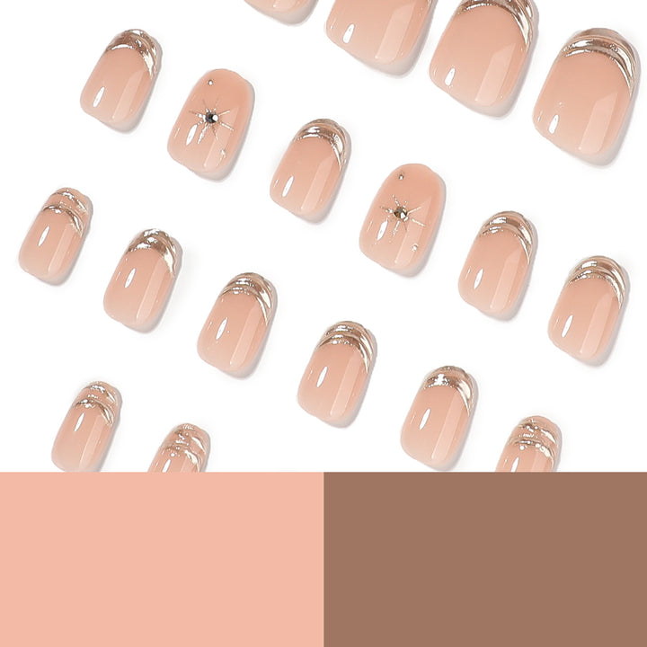 Glamorous nail extensions with elegant metallic accents Stornfield