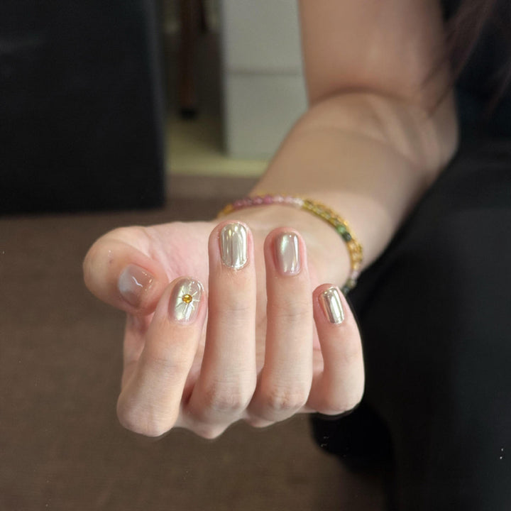Artificial nails with luxurious metallic finish and sparkling accent Stornfield