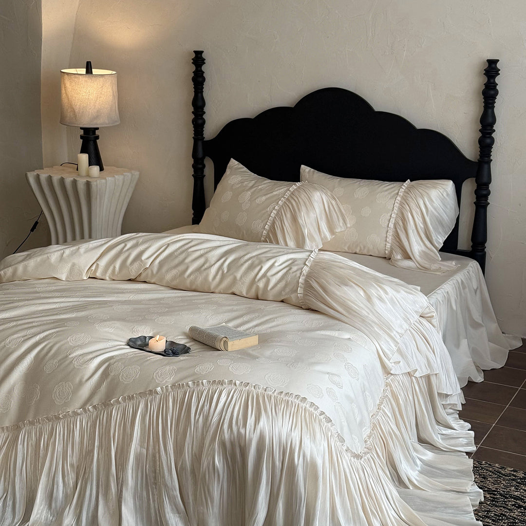 Luxurious satin bed linen set with ruffles and rose relief