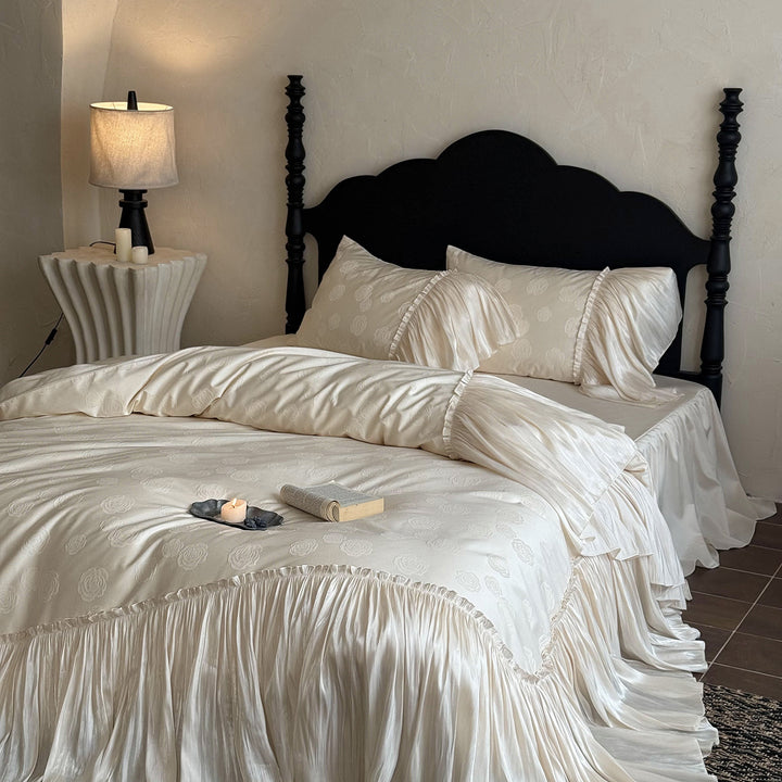 Luxurious satin bed linen set with ruffles and rose relief