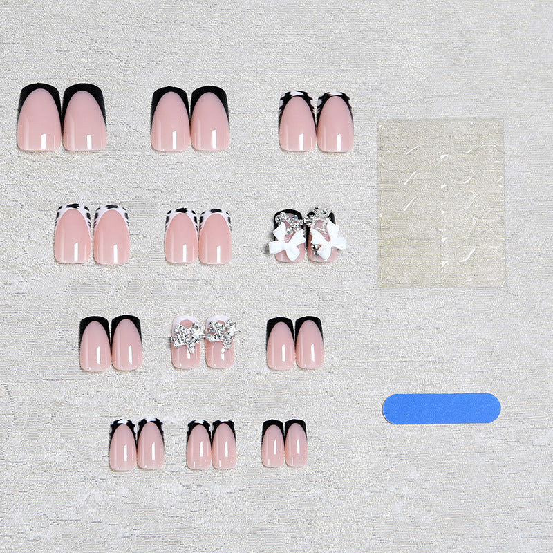 Acrylic nail set with glamorous starlights and elegant embellishments Stornfield