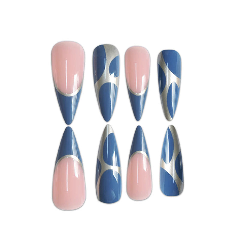 Artistic Stiletto Press-On Nail Design with Metallic Trim Stornfield