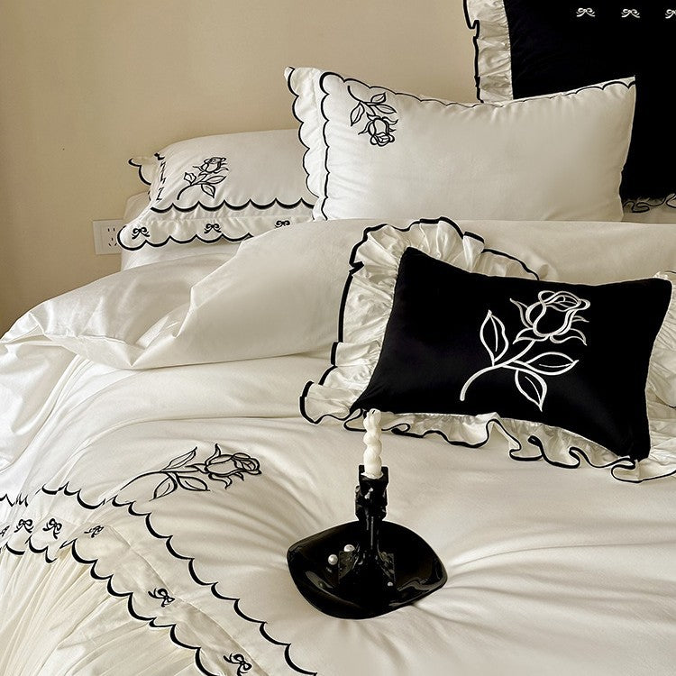 Elegant cotton satin bedding set with contrasting edge embroidery and frill