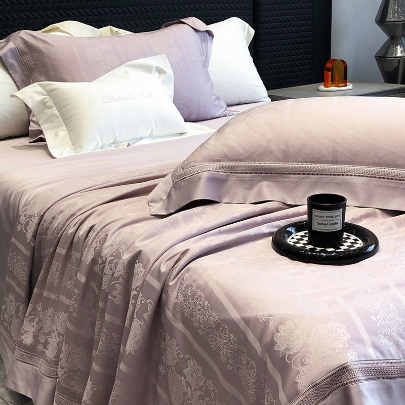 Premium bedding set made of cotton satin with subtle circle stitching and hotel closure