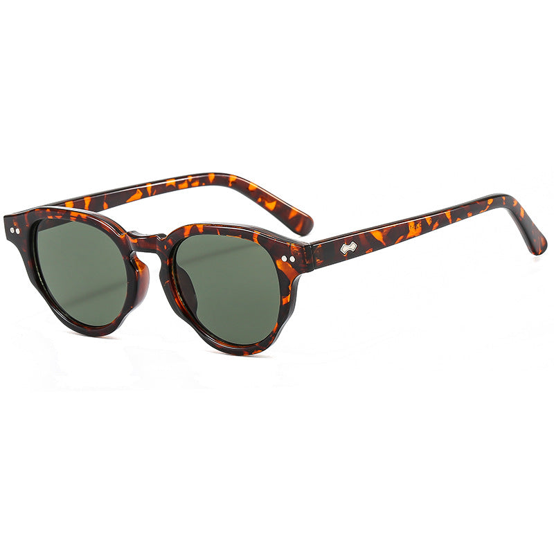 Women's fashionable sunglasses with oval frame and green glass Stornfield