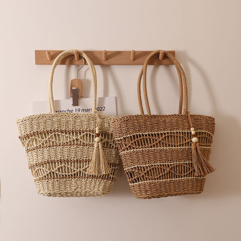 Handcrafted straw tote bag with decorative tassel detail Stornfield