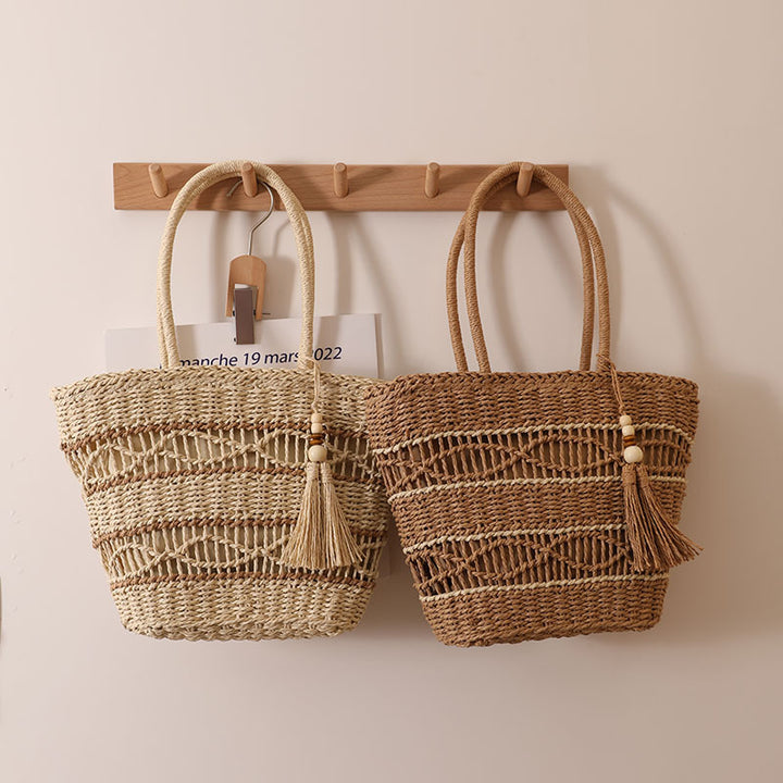 Handcrafted straw tote bag with decorative tassel detail Stornfield
