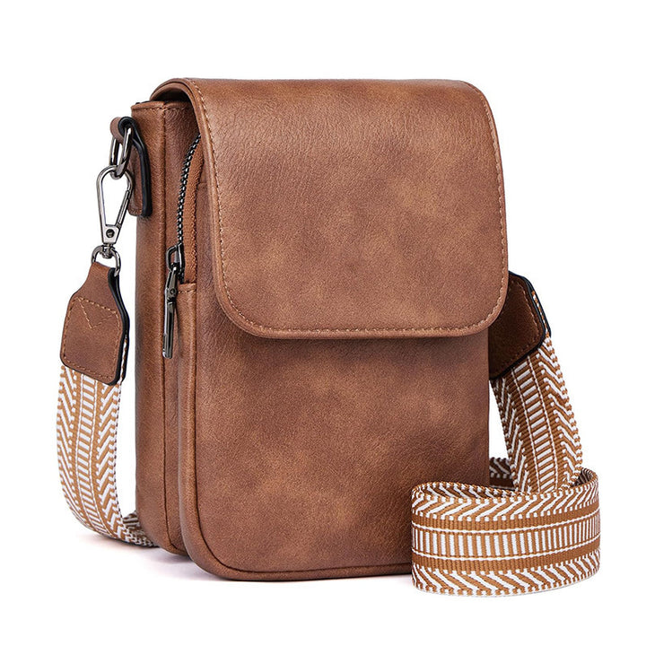 Small crossbody bag with decorative shoulder strap Stornfield