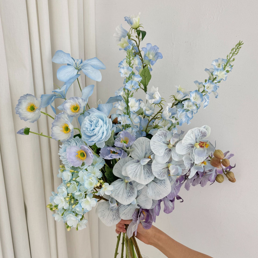 Luxurious artificial flower bouquet with blooming orchids