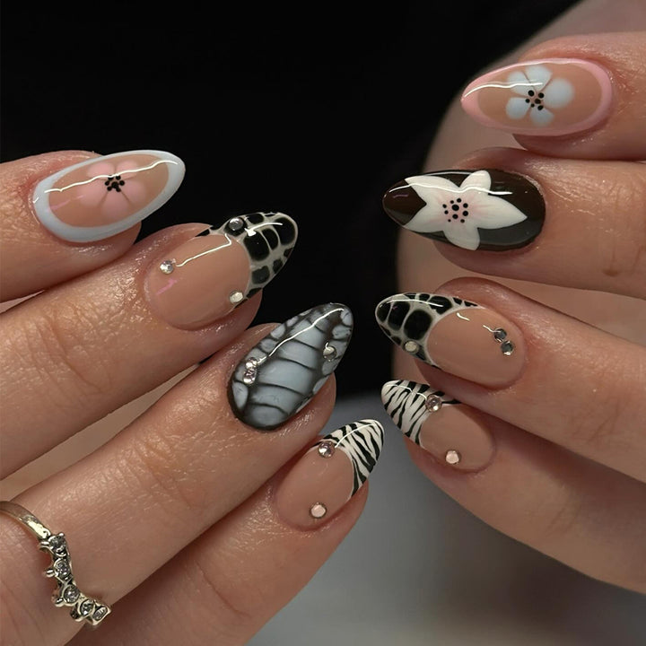 Nail art with elegant designs and embellishments Stornfield
