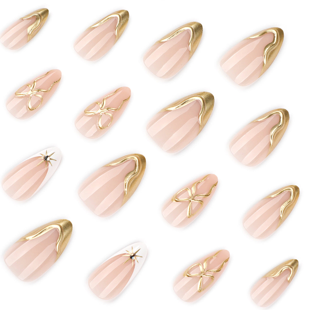Artistic stiletto nails with elegant gold accents Stornfield