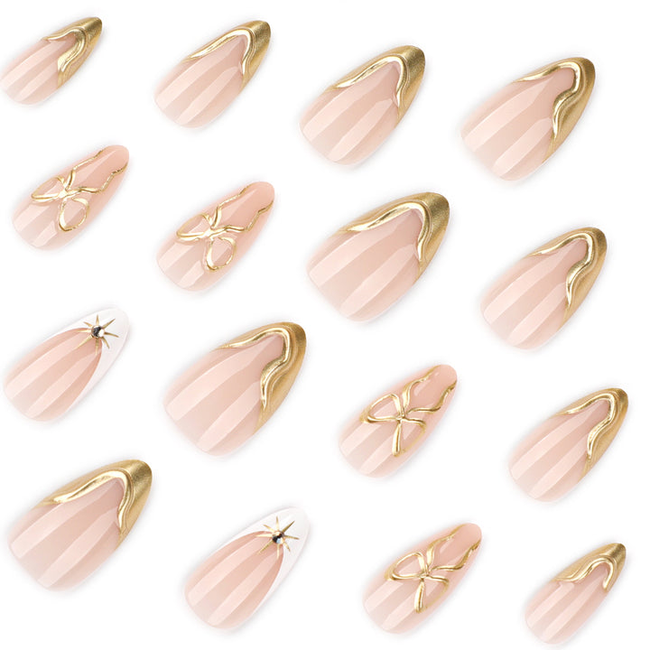 Artistic stiletto nails with elegant gold accents Stornfield