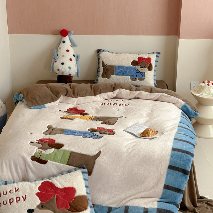 Cozy quilted bedspread with plush appliqués and matching pillowcases