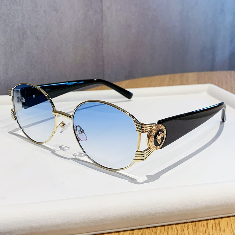 Ladies elegant sunglasses with luxurious metal frame and mirrored lenses Stornfield