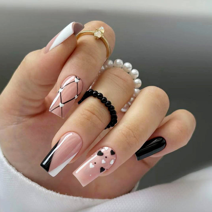 Artful nail art with heart patterns Stornfield