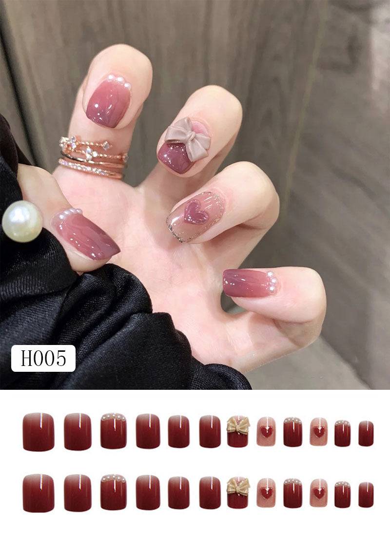 Artificial nail tips with bow design Stornfield