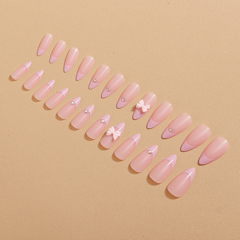 Glamorous nail art with bow detail Stornfield