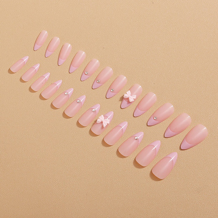 Glamorous nail art with bow detail Stornfield