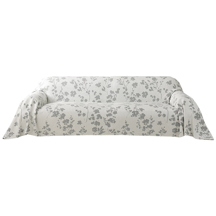 Elastic sofa cover with floral relief structure and universal fit