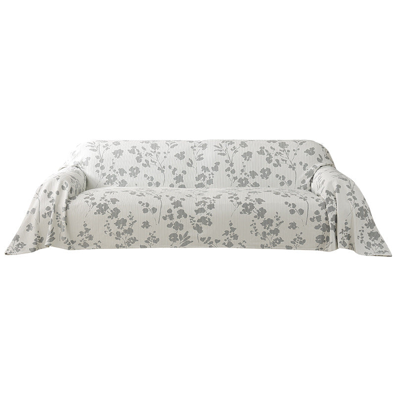 Generous sofa cover for 3-seater with floral jacquard structure