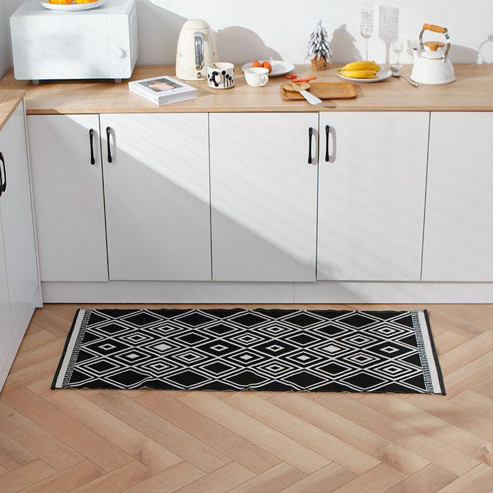 Flat-woven kitchen runner with non-slip underside and geometric diamond pattern