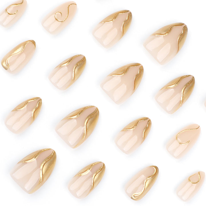 Artistic Stiletto Nails with Elegant Gold Accents Stornfield