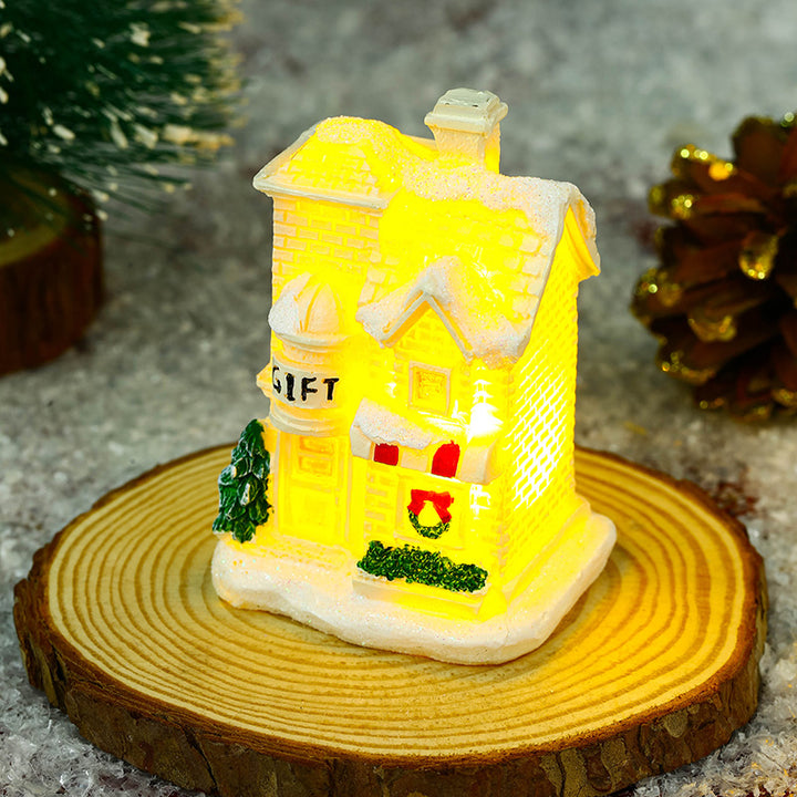 Illuminated Christmas village house with festive decoration Stornfield