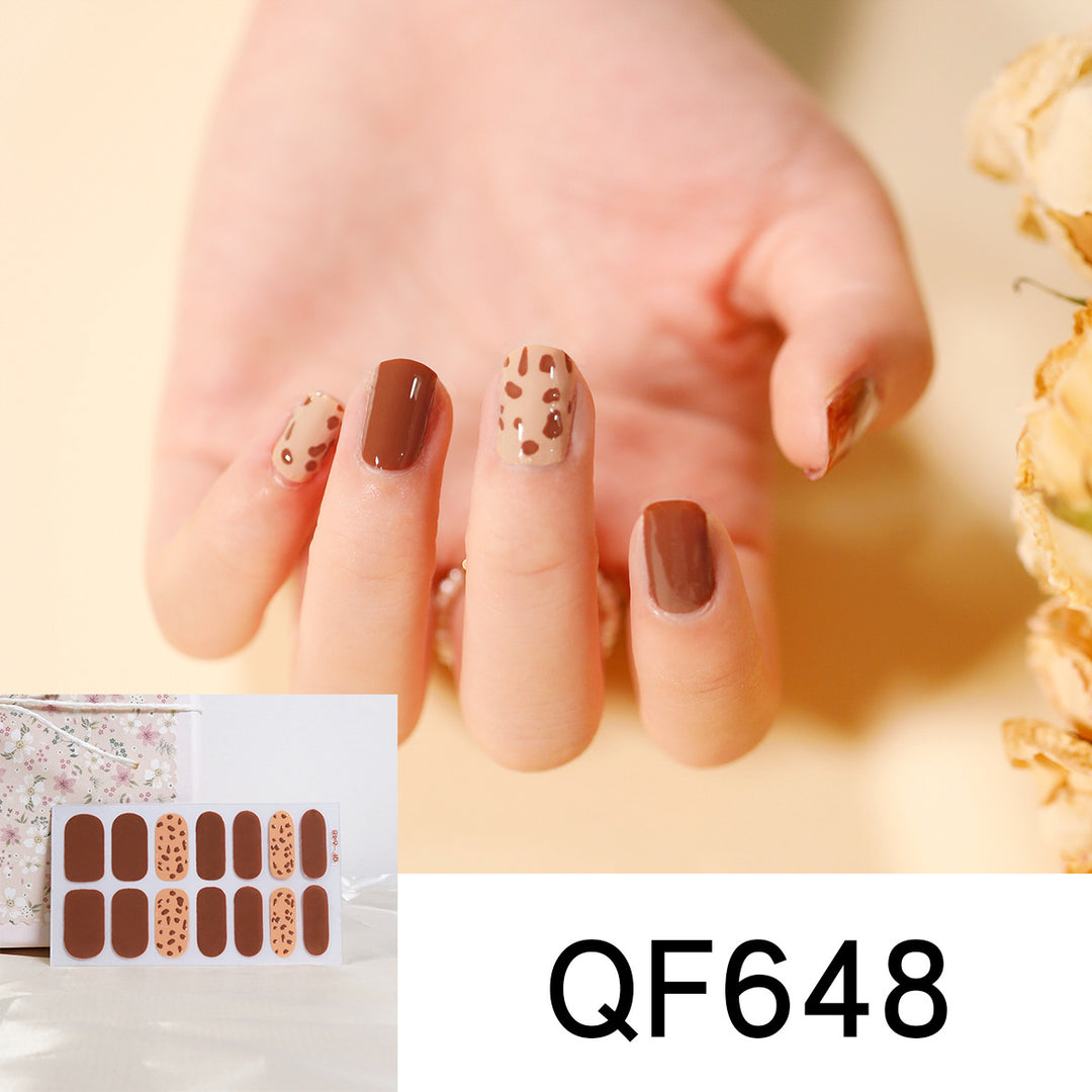 Artificial nail art with heart-shaped designs and soft color gradients Stornfield