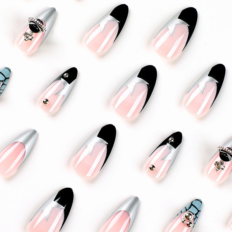 Artful acrylic nails with elegant 3D decorations and glitter effects Stornfield