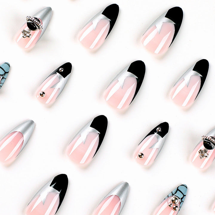 Artful acrylic nails with elegant 3D decorations and glitter effects Stornfield
