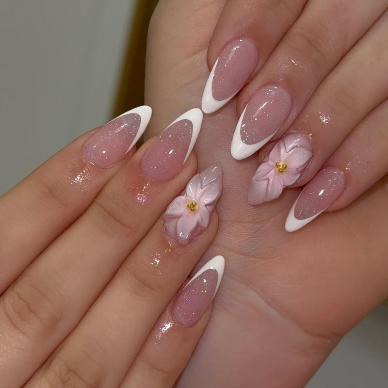 Artistic French-Tip Nail Extensions with Flower Accents Stornfield