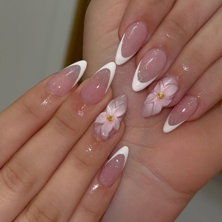 Artistic French-Tip Nail Extensions with Flower Accents Stornfield
