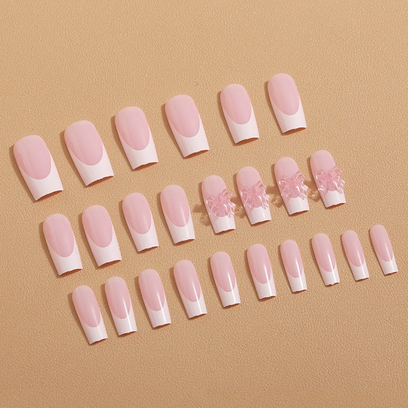 Artificial nail tips with delicate bow decorations Stornfield