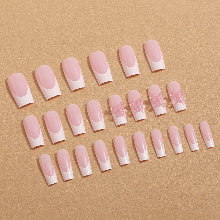 Artificial nail tips with delicate bow decorations Stornfield