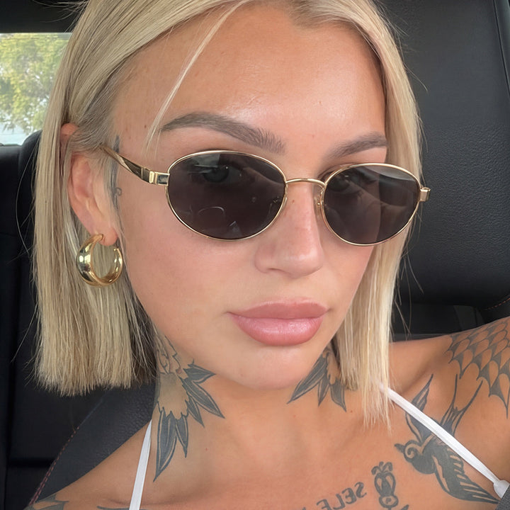 Women's fashionable sunglasses with narrow metal frame Stornfield