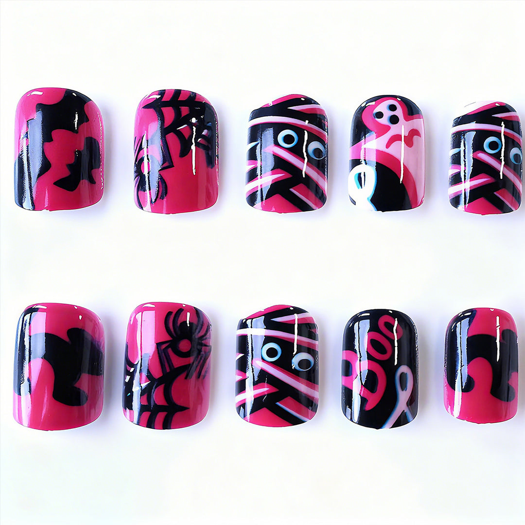 Halloween Artificial Nails with Playful Designs and Glitter Details Stornfield