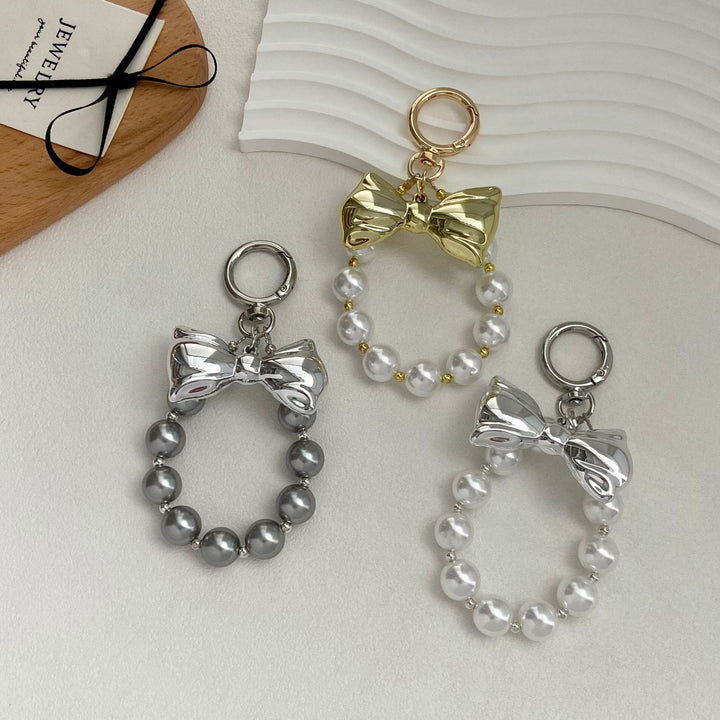Elegant Pearl Bow Keychain Stornfield