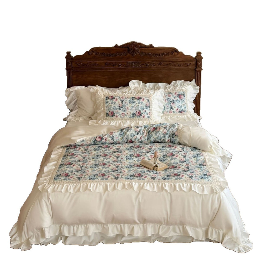 Romantic bedding set made of cotton satin with ruffle and floral medallion