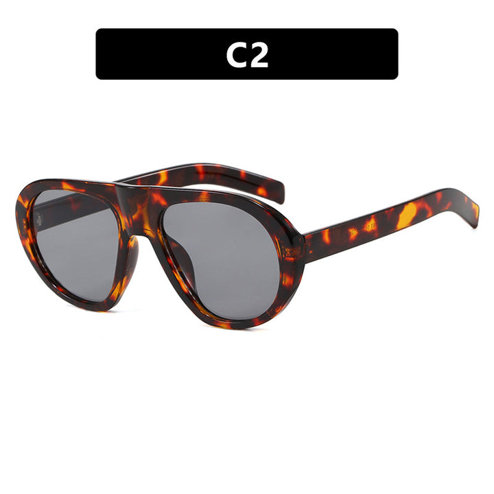 Women striking sunglasses with futuristic frame and sturdy design Stornfield