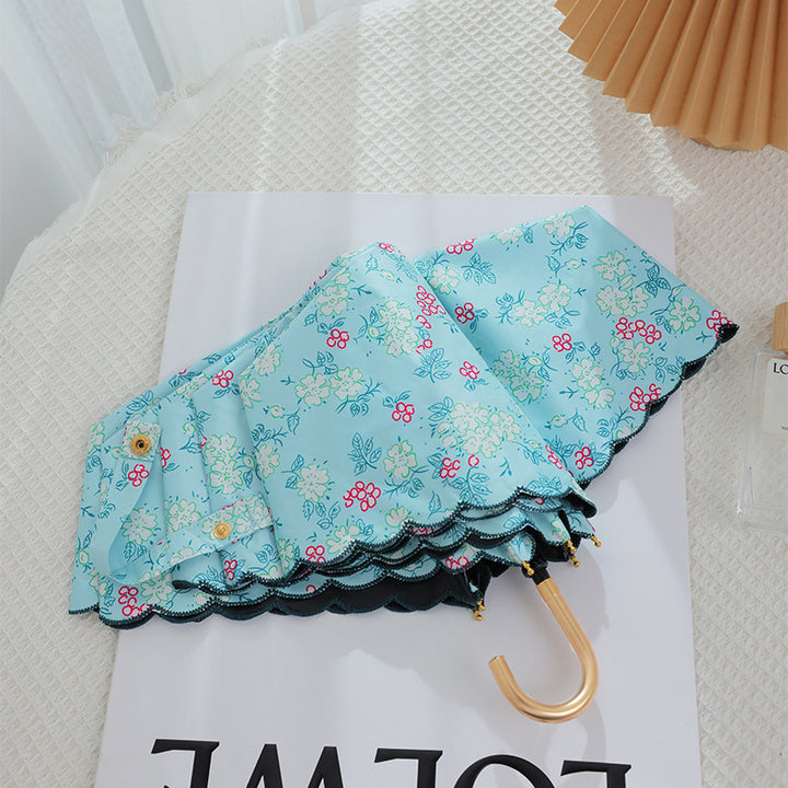 Women's elegant automatic folding umbrella with floral details Stornfield