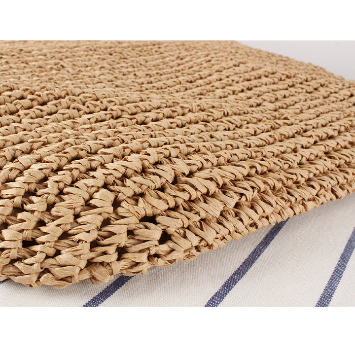 Designer straw bag with fringe decoration Stornfield