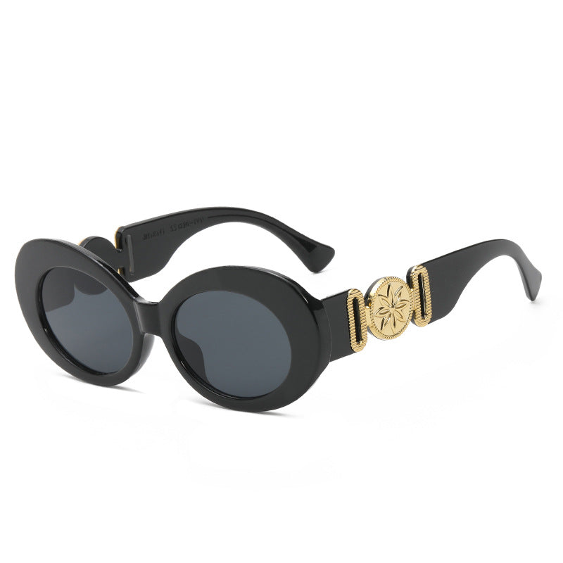 Ladies fashionable sunglasses with striking golden accents Stornfield