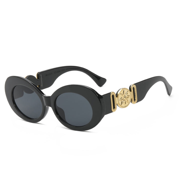Ladies fashionable sunglasses with striking golden accents Stornfield