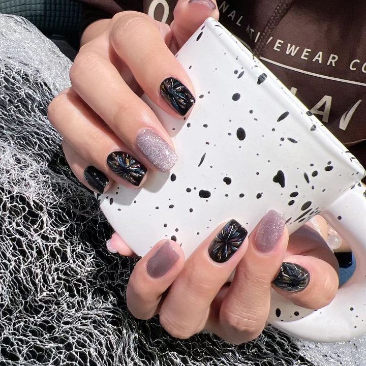 Artificial nails with glitter and floral patterns Stornfield