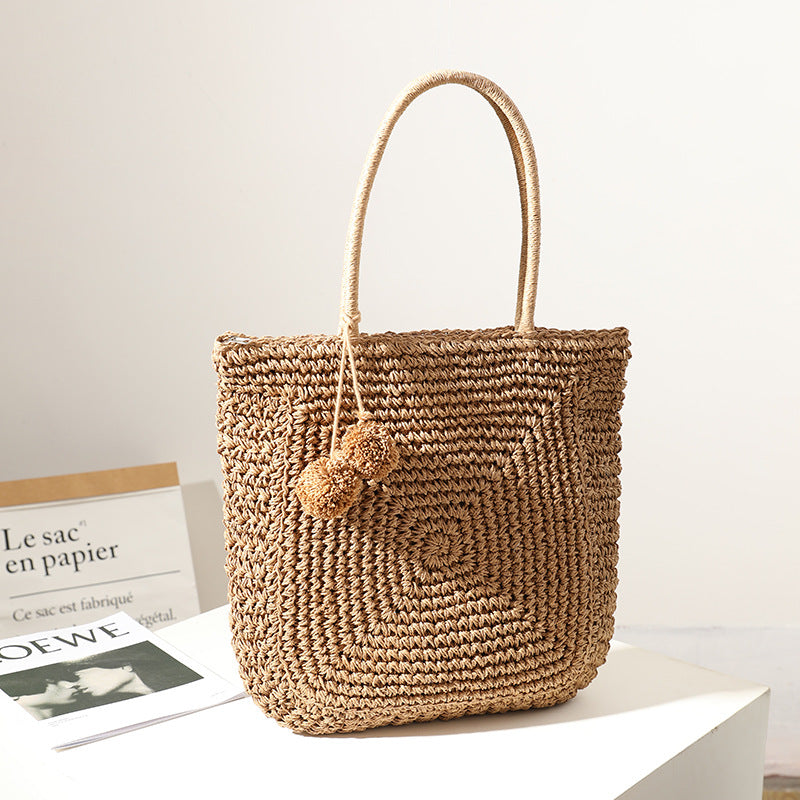Handmade straw bag with pompom details Stornfield