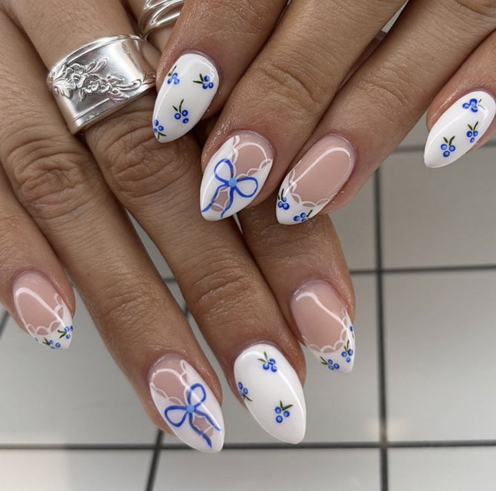 Artificial nails with modern night motif Stornfield