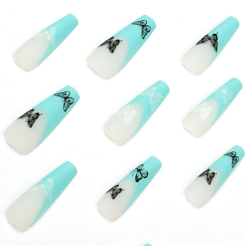 Artificial nail extensions with butterfly design Stornfield