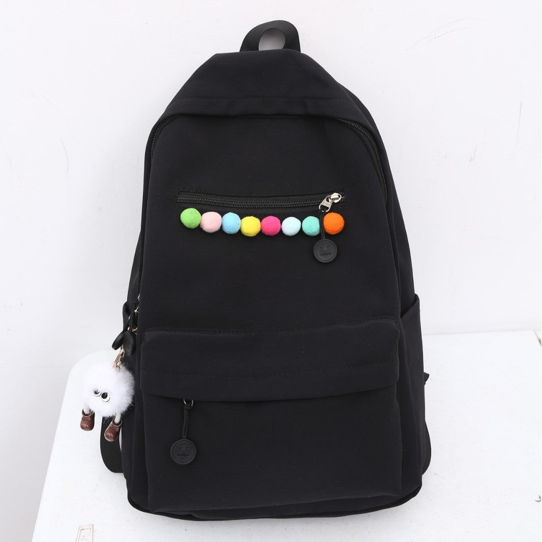 Practical backpack with colorful applications Stornfield