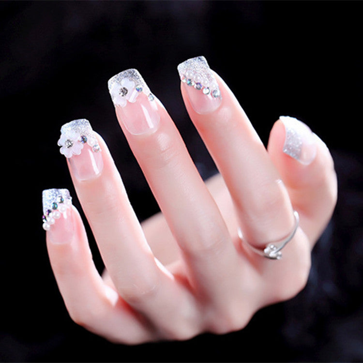 Artificial nails with delicate floral decorations Stornfield