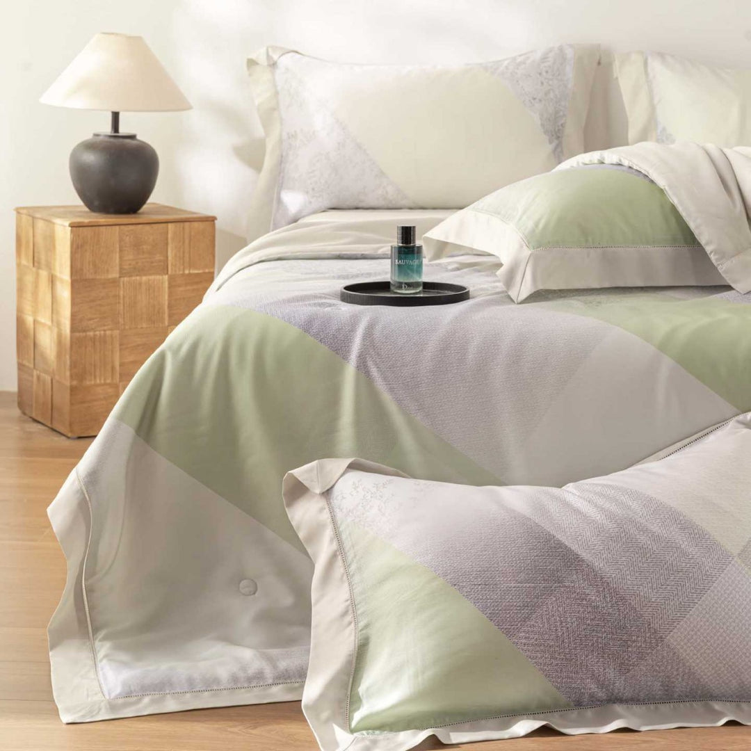 Luxurious cotton satin bedding set with delicate leaf design and hem detail